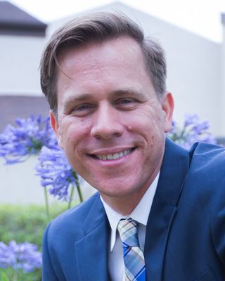 Chad K. Cox