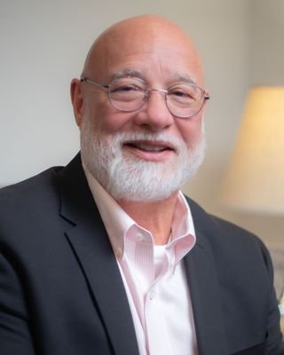 Dennis W Howard